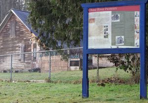 Interpretive Sign for Chase River Pioneers with Stark's Barn in the background