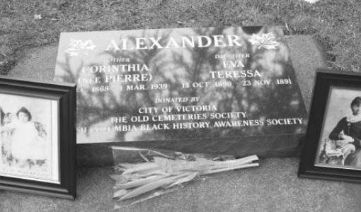 grave marker flat gray stone with white lettering
