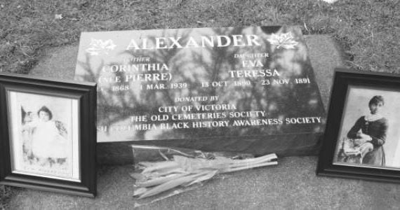 grave marker flat gray stone with white lettering