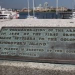 bronze plaque inlaid on top of concrete causeway wall