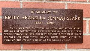 plaque on brick wall