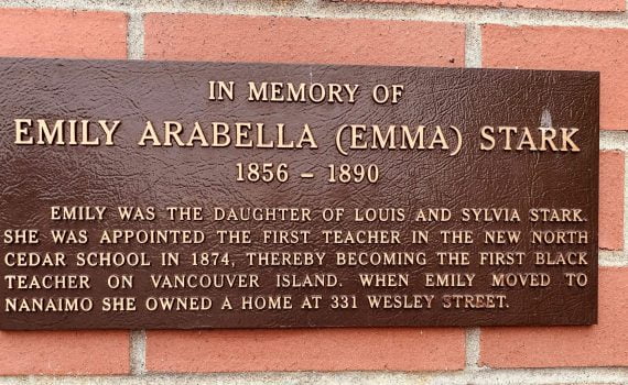 plaque on brick wall