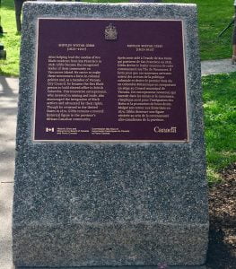 bronze plaque on concrete base