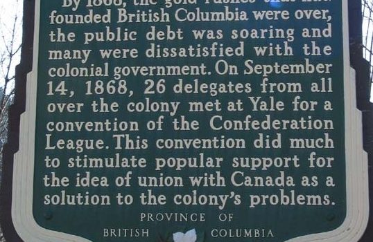 rectangular plaque with title The Yale Convention mounted on sign post