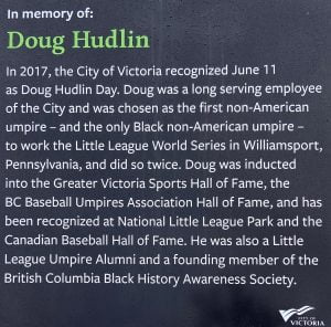 plaque white text on very dark grey background