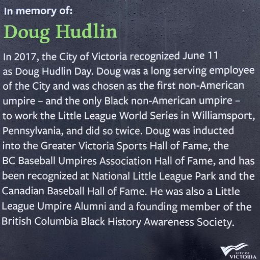 plaque white text on very dark grey background