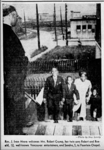 b&w newspaper photo-family walking up front steps of churchtering church