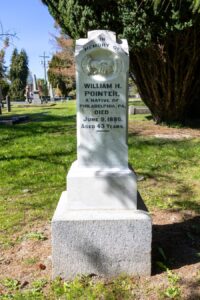 white marble tablet with flush lead lettering