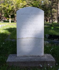 white marble column on granite base