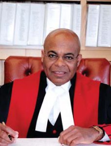 judge seated at desk