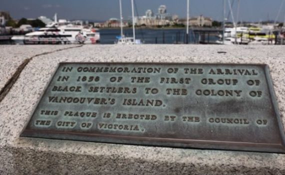 bronze plaque inlaid on top of concrete causeway wall