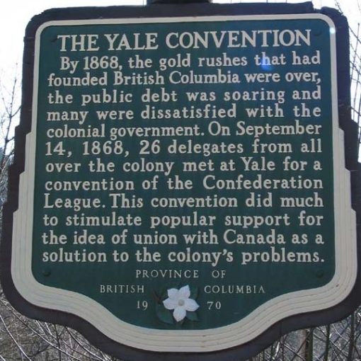 rectangular plaque with title The Yale Convention mounted on sign post