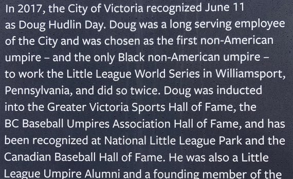 plaque white text on very dark grey background