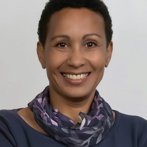 portrait of black woman with short hair, dark un-collared dress with scarf