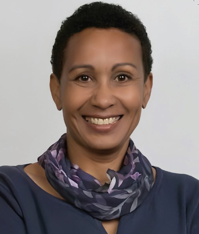 portrait of black woman with short hair, dark un-collared dress with scarf