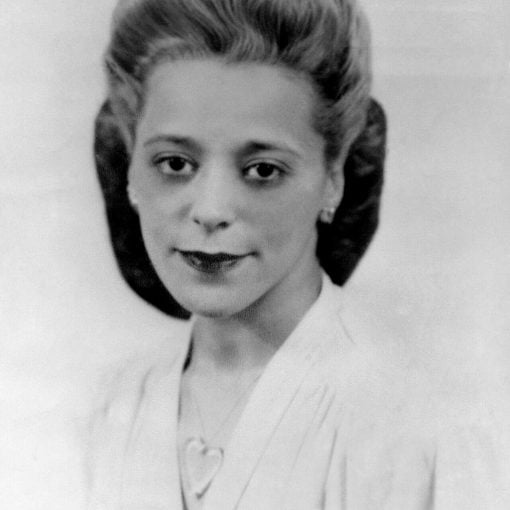 b&w headshot Black women with v-neck light dress, 1940 hair styled